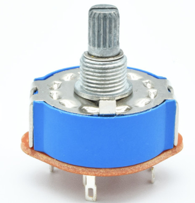 interruptor rotativo da faixa do diâmetro de 25mm com a tampa protetora contra poeira azul usada para o dispositivo e o transdutor elétricos